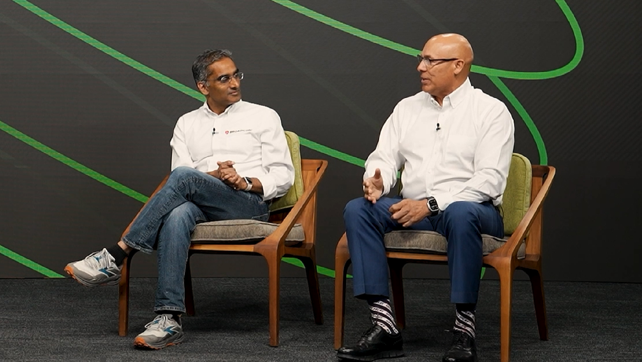 Ray Mota and Ram Velaga having a discussion